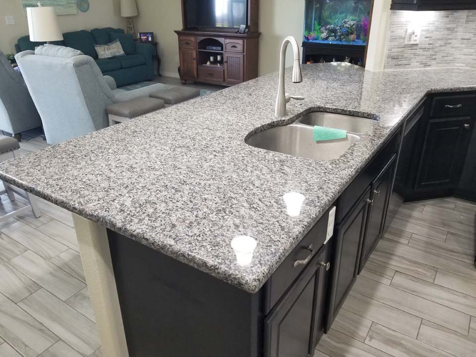 20230126_134840 This shows a kitchen countertop after removing stains in granite